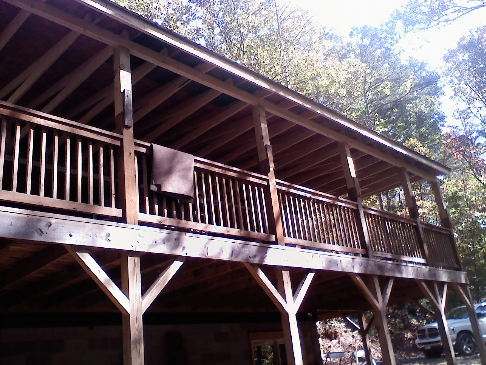 Timber framing under a new elevated porch and deck — Roof Leak Repair in Asheville by Roofing Brothers